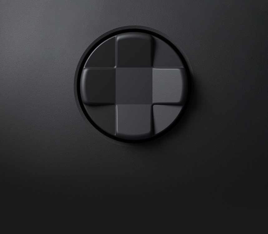 A closeup of the directional pad on XBOX controllers.