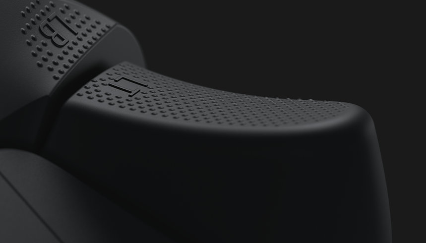 A closeup of the Left Bumper and trigger grip texture on a black XBOX Wireless Controller.