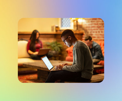 Person staring at a computer in a public place