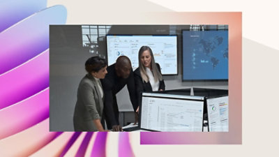 A decorative image of security professionals working on a computer