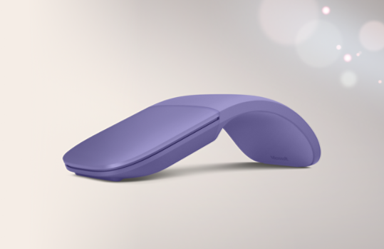 A violet Surface Arc Mouse.