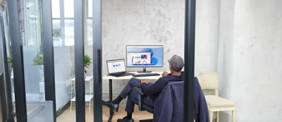 A person and person looking at a phone