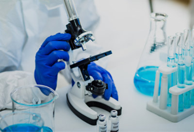 A person using a microscope