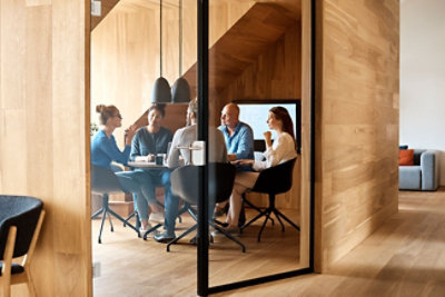 A group of people sitting around a table