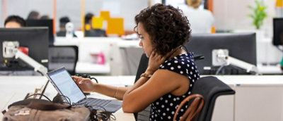 A women working on laptop.
