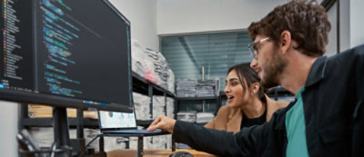 Two professionals engaging in a discussion.