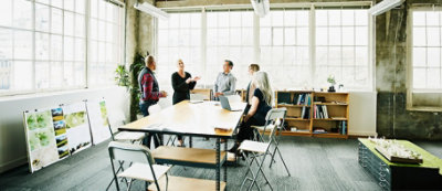 A group of people in a meeting