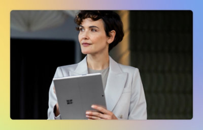 A person holding a tablet.