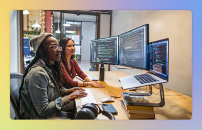A group of women looking at computers