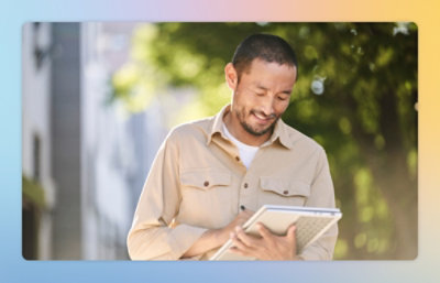 A man holding a tablet.