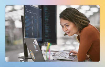 A woman working on a laptop