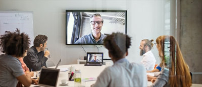 A group of people in a meeting