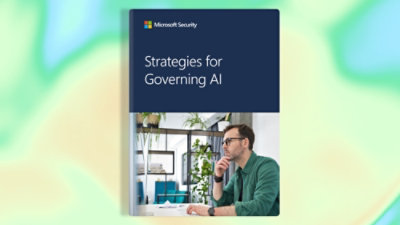 A cover of a book showing a man looking at a computer screen.