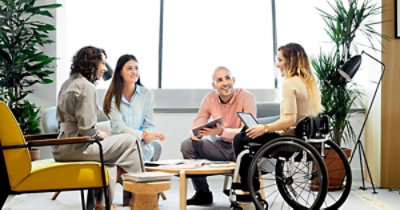 A group of people sitting around a table