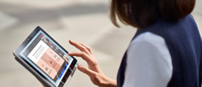 a woman using tablet