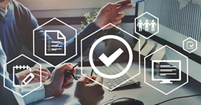 A group of hands holding glasses