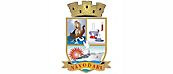 Coat of arms featuring a castle, a scene with a ship, sun, and beach, chemical flasks, and a stork, with the text "navoari" on a banner.