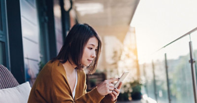 Woman looking at her phone.
