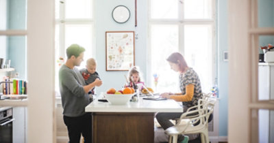 A family sitting at a table