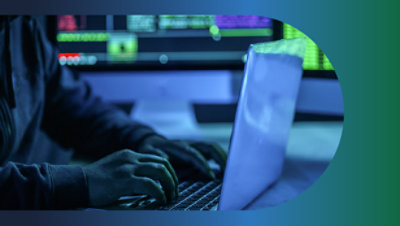 A person typing on a keyboard.