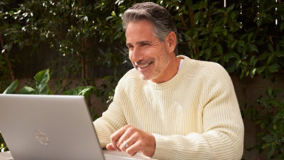 A person using a laptop.