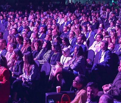 A group of people sitting in a room.