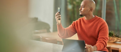 A person taking selfi with his phone