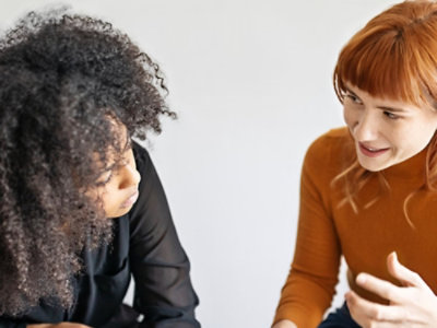 Two womens are discussing