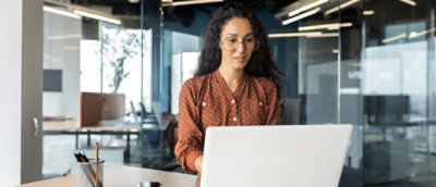 A woman working on laptop