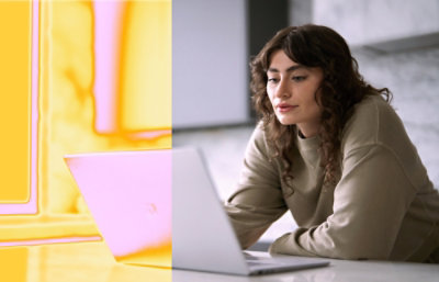 A person looking at a laptop.