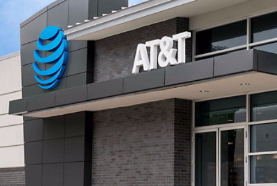 A building with a sign that reads AT&T on the front.