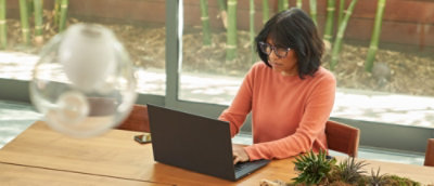 A woman working with laptop