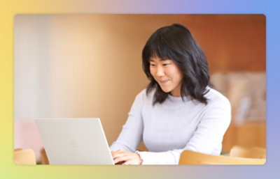 A women working on a laptop.