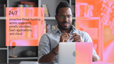 A person looking at laptop screen.
