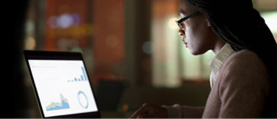 A person looking at a computer screen.