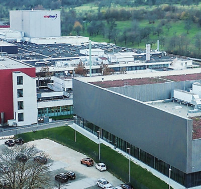 A buildings with green trees