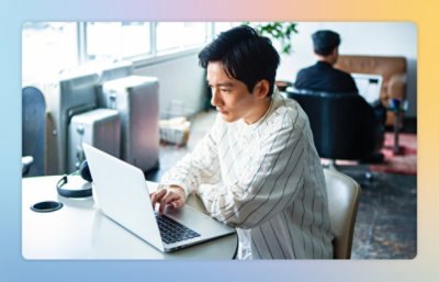 A person typing on a laptop.