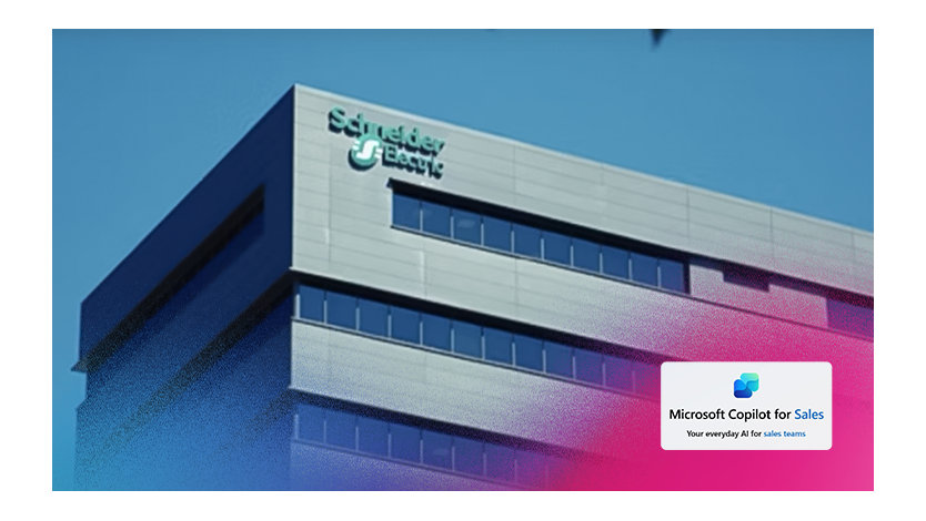 Un bâtiment avec une enseigne verte portant le nom "Schneider Electric".