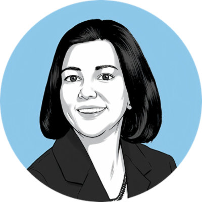 Una mujer de pelo corto y negro vestida con un traje.