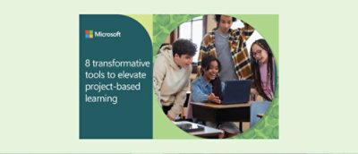 A group of people looking at a laptop.