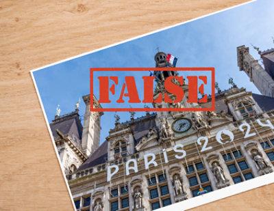 Photo d’un bâtiment sur lequel figurent une grosse horloge et le texte PARIS 2024