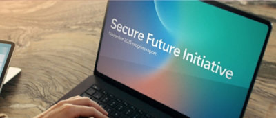 A close-up of a laptop screen displaying the text Secure Future Initiative.