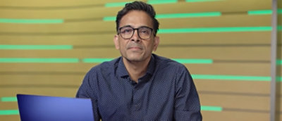 A man wearing glasses.