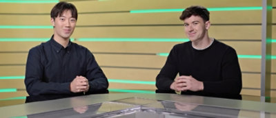 Two men sitting at a table.