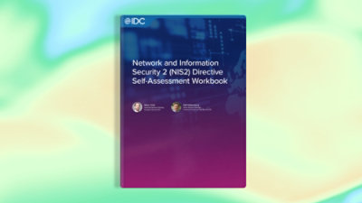 A close-up of a book with a purple and blue cover featuring the text Network and Information Security 2 (NIS2) Directive Self-Assessment Workbook.