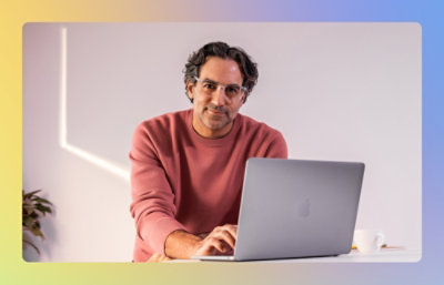 A man looking at the camera and smiling