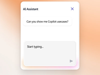 A group of people looking at a laptop.