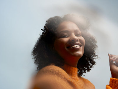 A women with short hair smiling