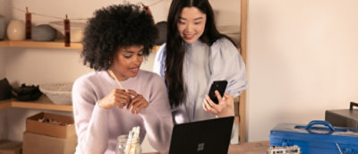 Both the people looking in the phone