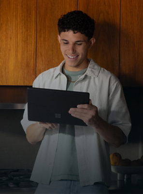 Man holding and looking at a table